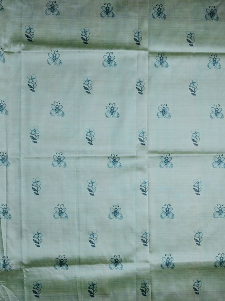 Tussar fancy saree light blue color allover zari weaves & printed border with contrast printed pallu and attaached printed blouse