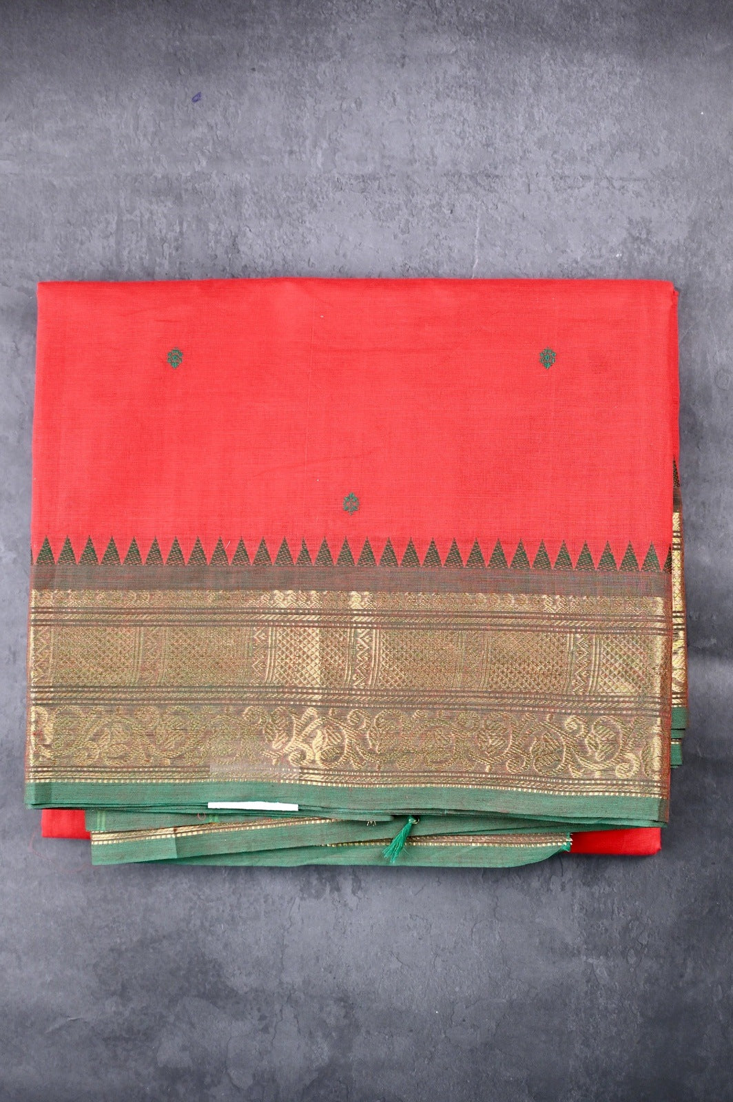 Kanchi cotton saree red and green color with motives, running pallu, big zari border and plain blouse.