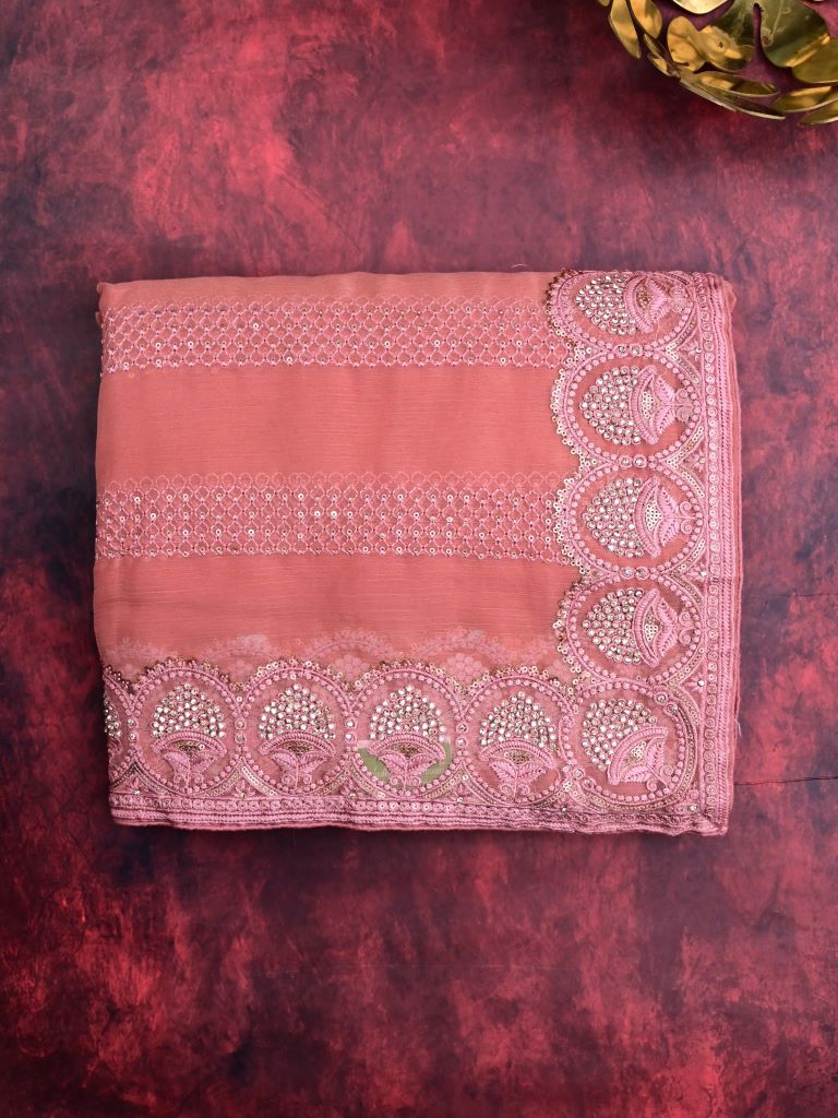 Chiffon fancy saree coral pink color allover embroidery stripes & embroidery border with running pallu and attached fancy blouse