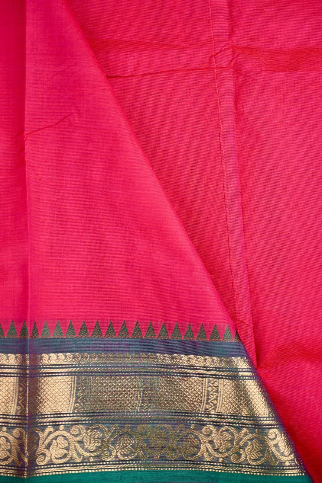 Kanchi cotton saree pink and green color, with running pallu, big zari border and plain blouse.