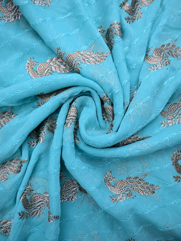 Chiffon fancy saree sky blue color allover embroidery & embroidery border with running pallu and attached fancy blouse