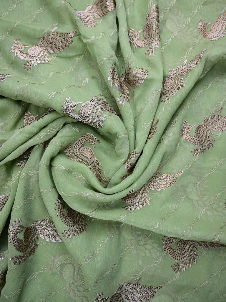 Chiffon fancy saree light pista green color allover embroidery & embroidery border with running pallu and attached fancy blouse