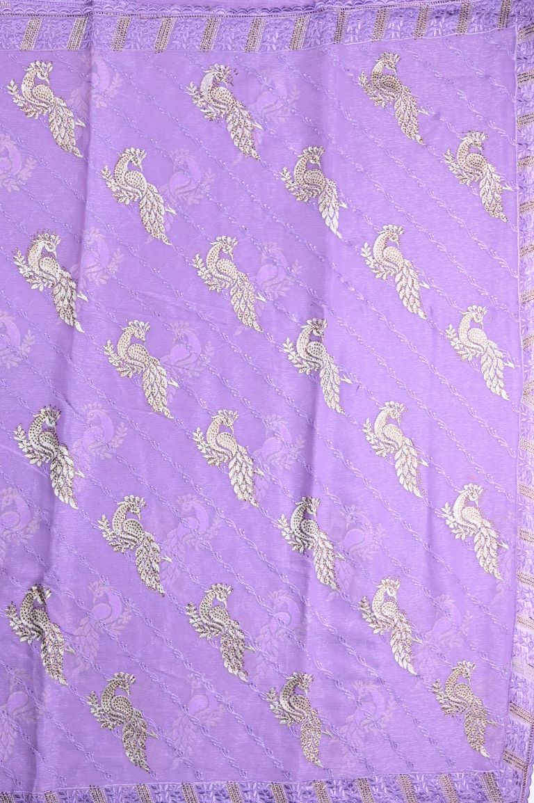 Chiffon fancy saree lavender color allover embroidery & embroidery border with running pallu and attached fancy blouse