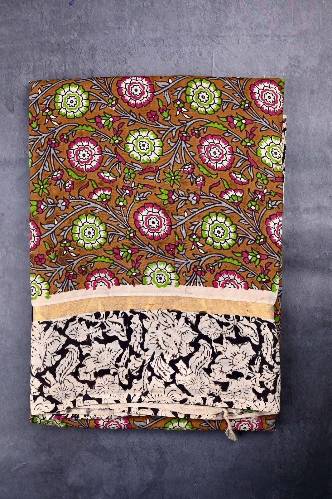 Kalamkari silk saree olive green color with allover kalamkari multi color prints, with big pallu, small border and printed blouse.
