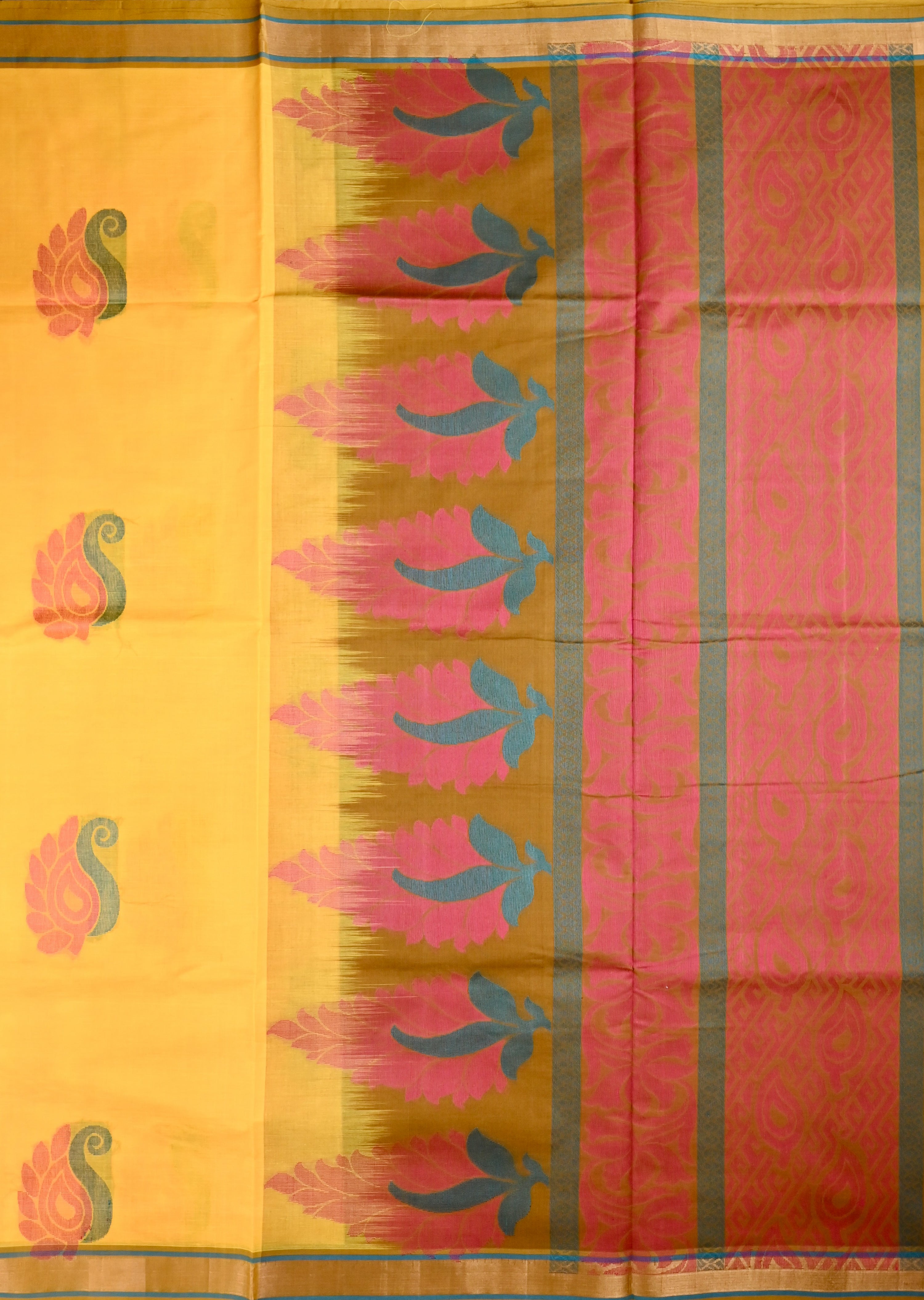 Kanchi cotton saree yellow color with thread motive weaves, small zari border, contrast pallu and plain blouse.