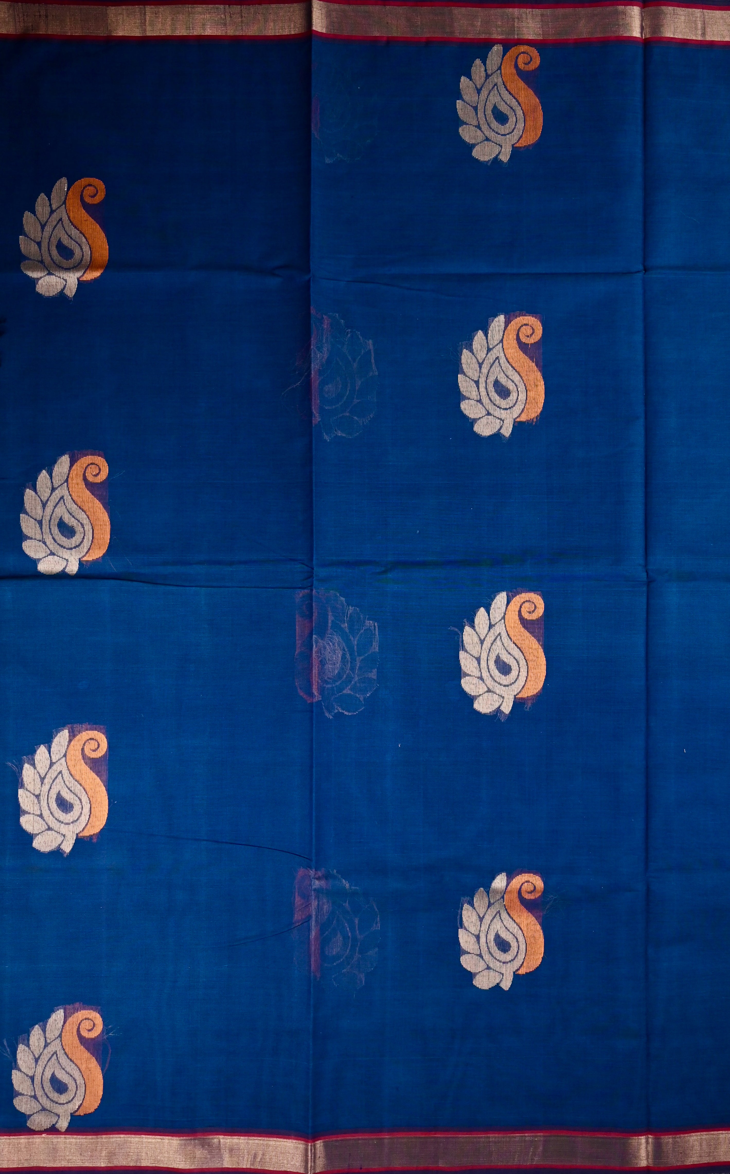 Kanchi cotton saree peacock blue color with thread motive weaves, small zari border, contrast pallu and plain blouse.