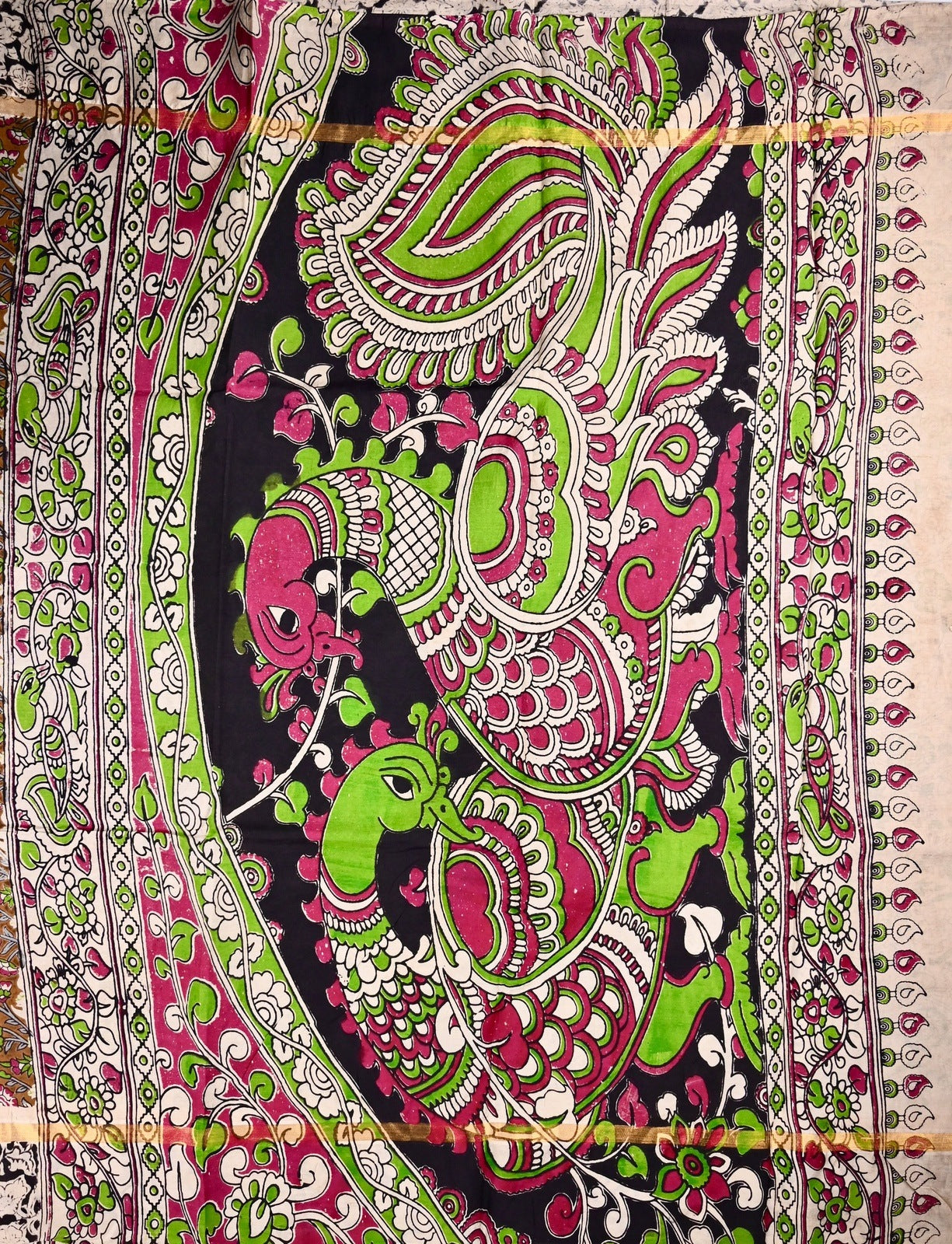 Kalamkari silk saree olive green color with allover kalamkari multi color prints, with big pallu, small border and printed blouse.