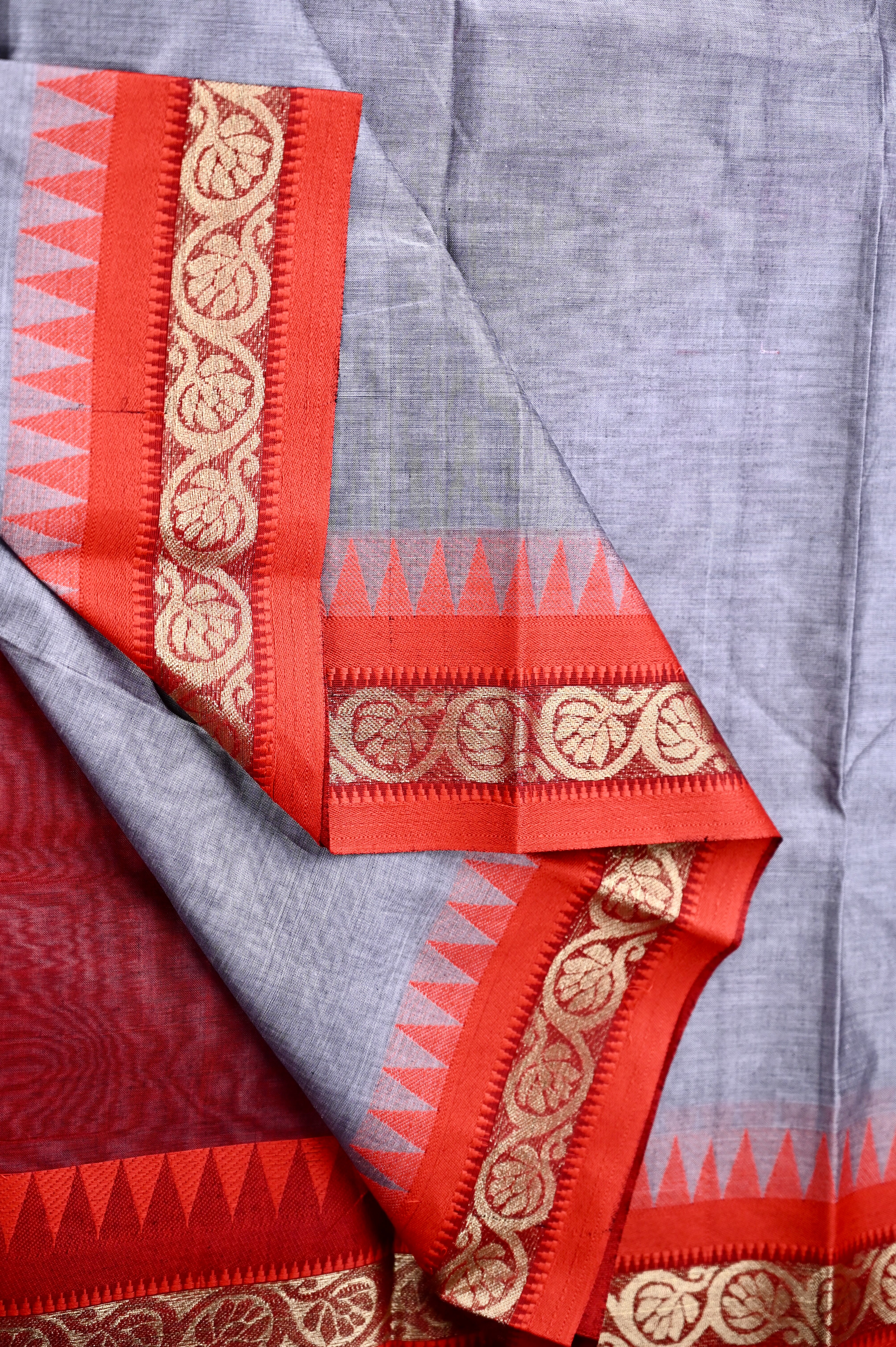 Dhaka cotton saree ash and red color with small zari border, big contrast pallu and plain blouse.