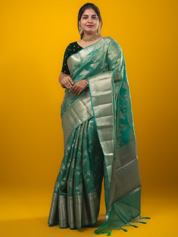 Kora tissue fancy saree lux green color allover zari weaves & zari border with brocade pallu and brocade blouse