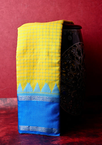 Banaras silk saree yellow and blue color with allover checks, big gap border, small pallu and brocade blouse