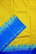 Banaras silk saree yellow and blue color with allover checks, big gap border, small pallu and brocade blouse