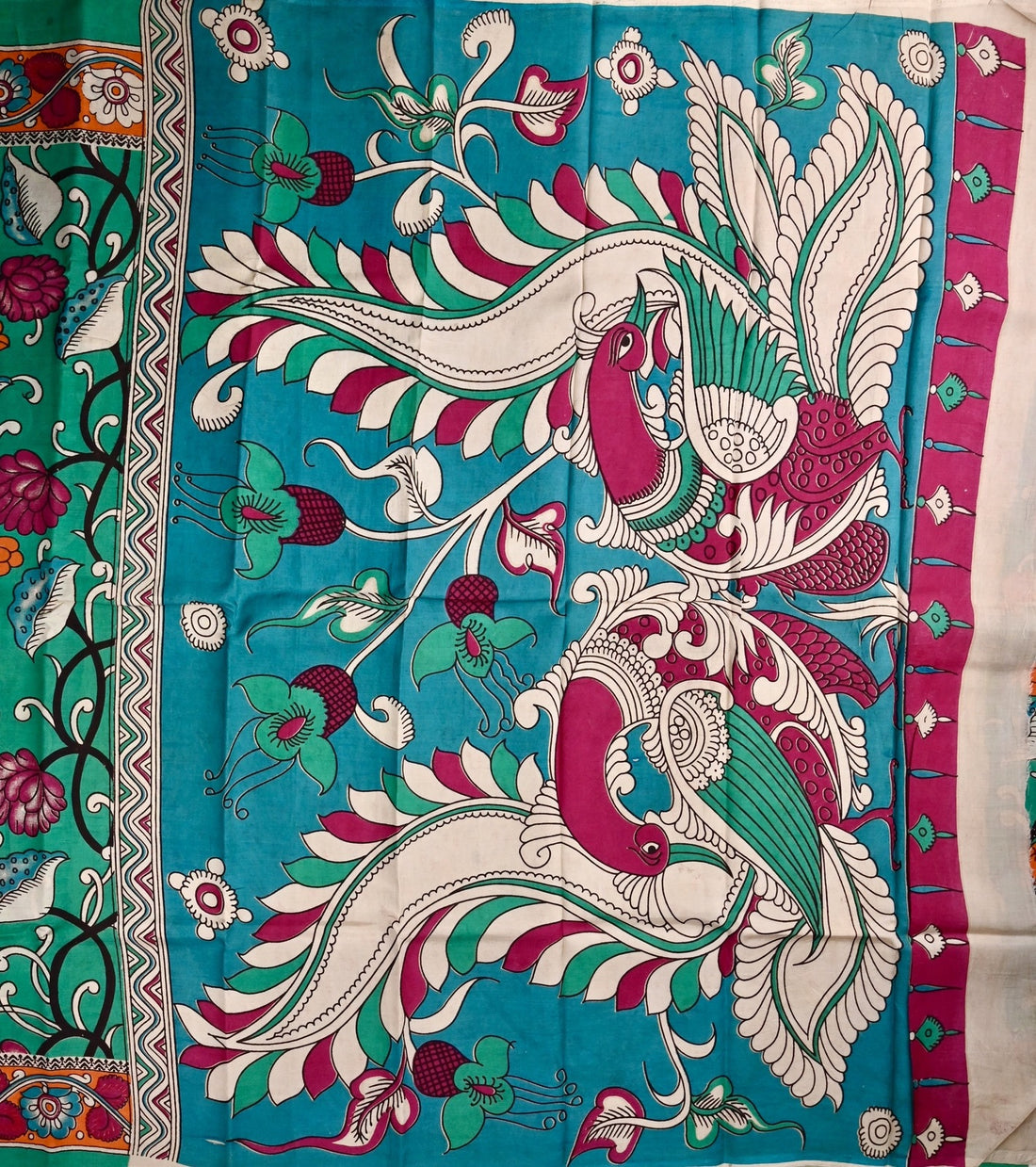 Kalamkari silk saree sea green color with allover kalamkari multi color prints, with big pallu, small border and printed blouse.