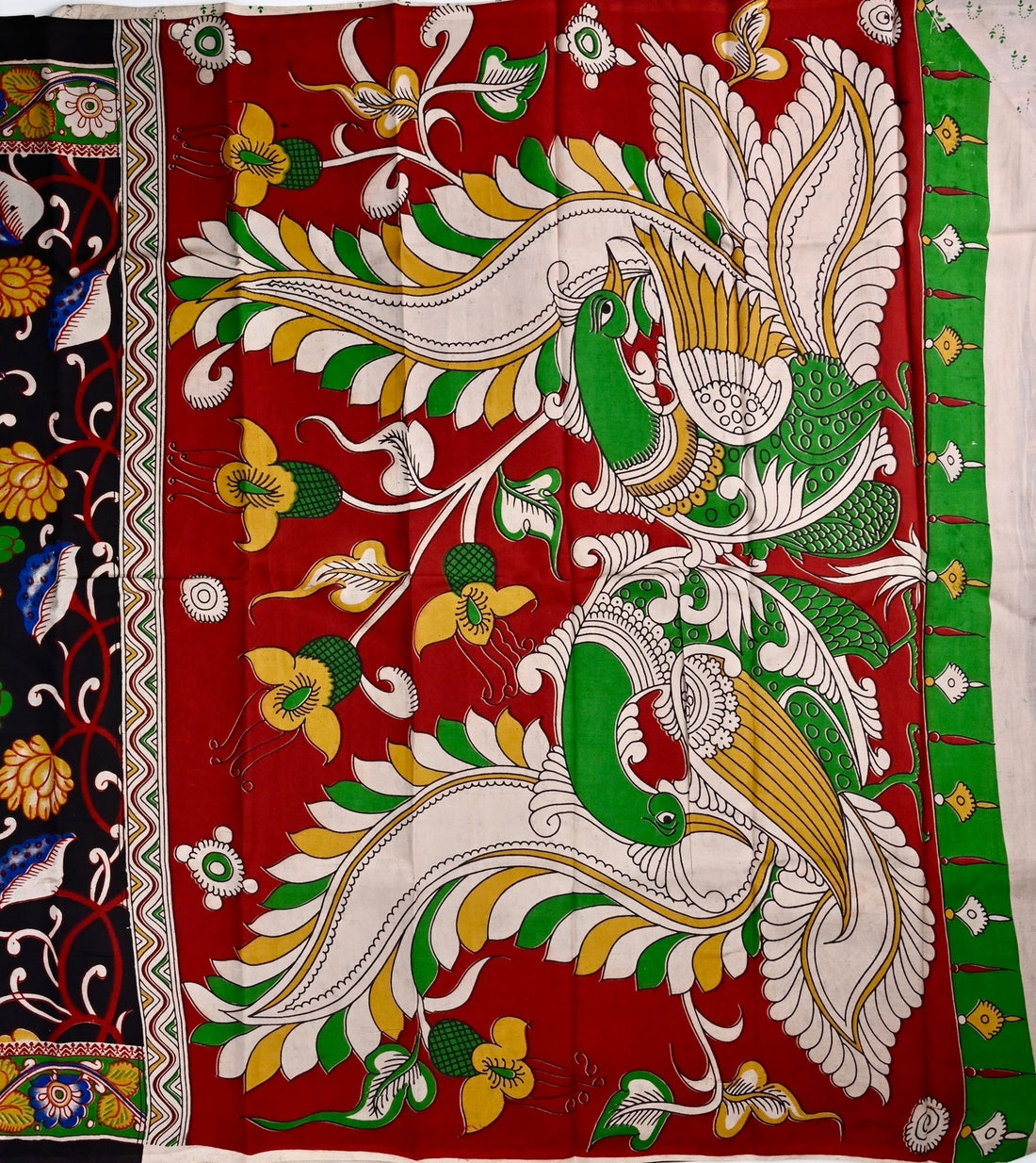 Kalamkari silk saree black color with allover kalamkari multi color prints, with big pallu, small border and printed blouse.