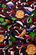 Kalamkari silk saree black color with allover kalamkari multi color prints, with big pallu, small border and printed blouse.