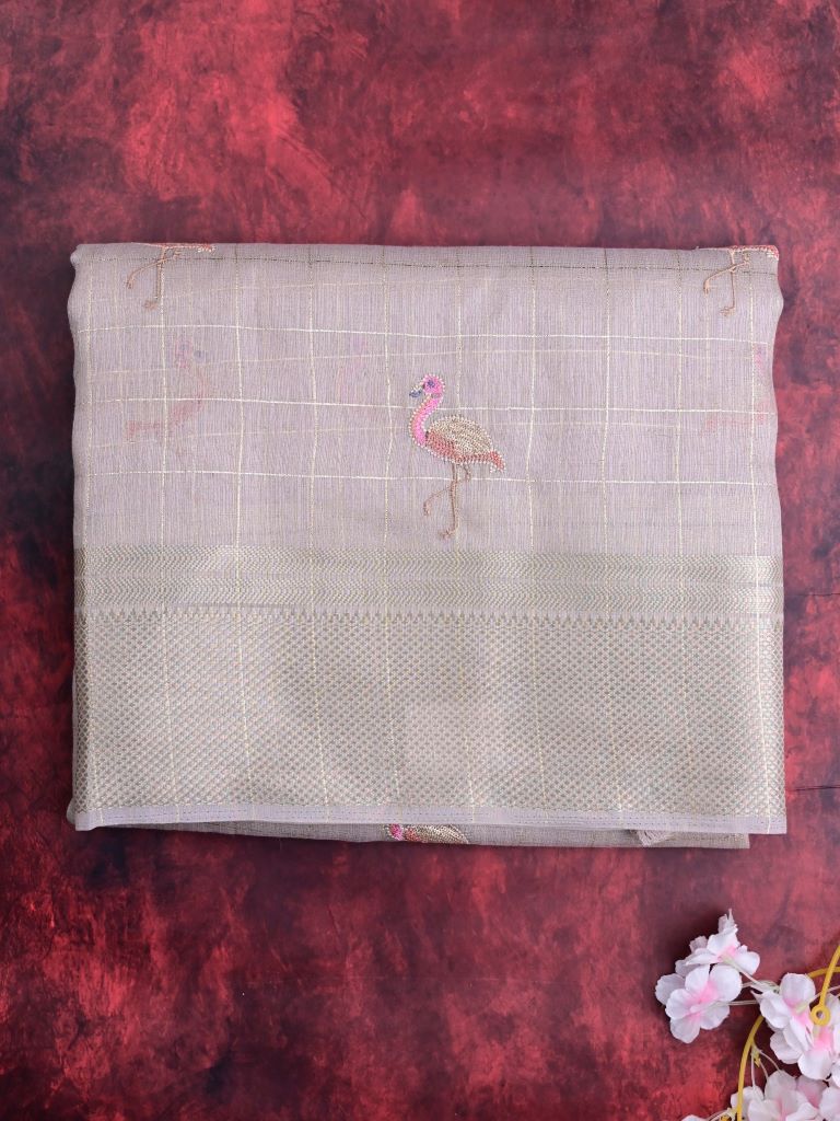 Lenin tissue fancy saree grey color allover checks, zari weaves & zari border with short pallu and attached self blouse