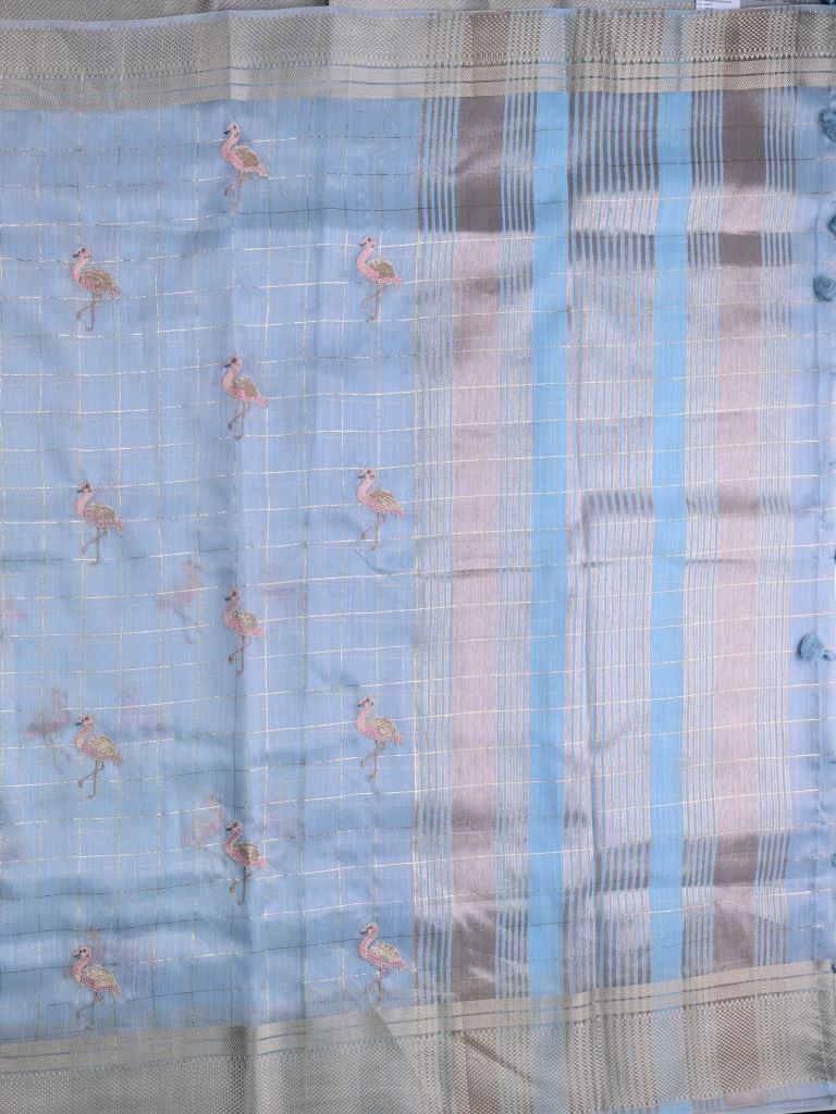 Lenin tissue fancy saree light blue color allover checks, zari weaves & zari border with short pallu and attached self blouse