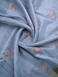 Lenin tissue fancy saree light blue color allover checks, zari weaves & zari border with short pallu and attached self blouse