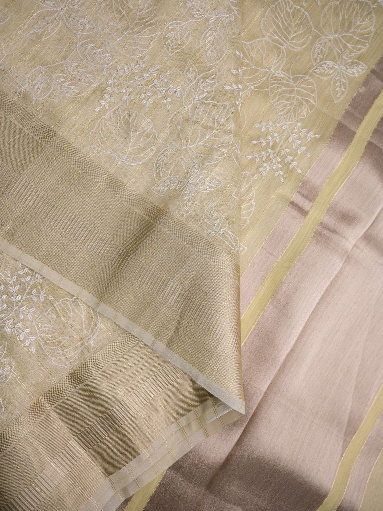 Jute tissue fancy sarees cream color allover embroidery & zari border with short pallu and attached plain blouse