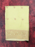 Dola silk fancy saree light yellow color allover zari motives & checks with short pallu and attached blouse