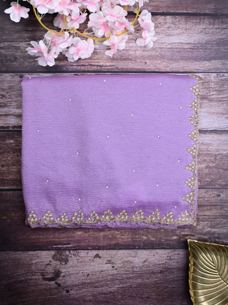 Chiffon crush fancy saree lavender color allover stone work & embroidery border with running pallu and attached self blouse