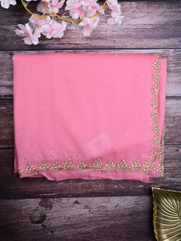 Chiffon crush fancy saree baby pink color allover stone work & embroidery border with running pallu and attached self blouse