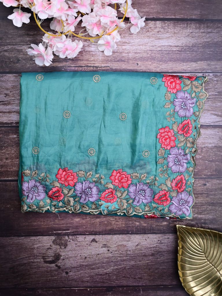 Soft organza fancy sarees cyan blue color allover embroidery motifs & embroidery border with running pallu and attached self blouse