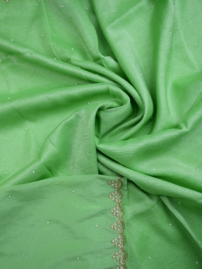 Chiffon crush fancy saree light green color allover stone work & embroidery border with running pallu and attached self blouse