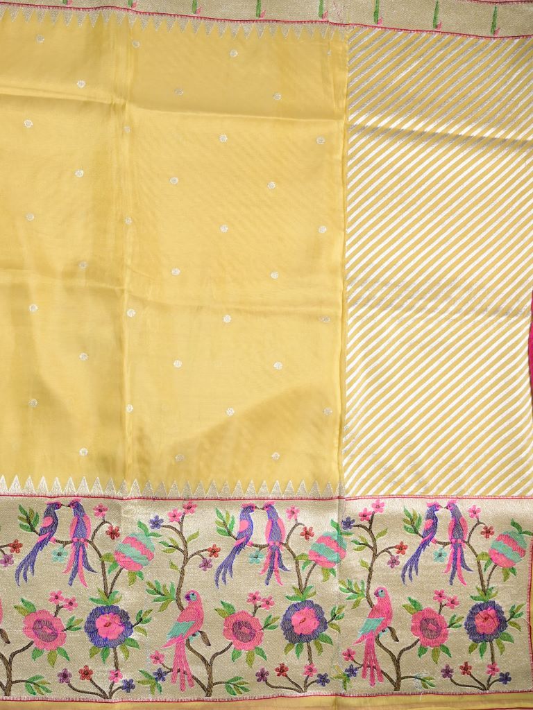 Dola tissue fancy saree golden yellow color allover zari motifs & paithani border with short pallu and plain self blouse