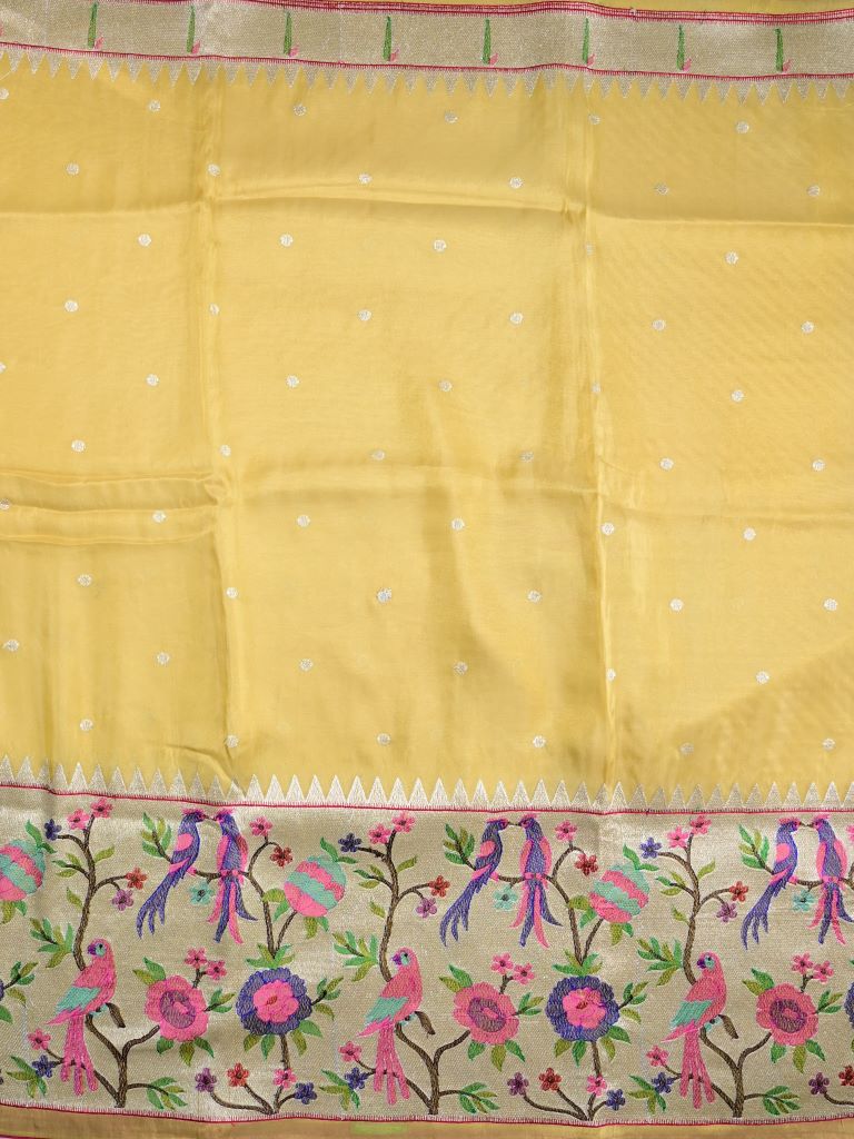 Dola tissue fancy saree golden yellow color allover zari motifs & paithani border with short pallu and plain self blouse