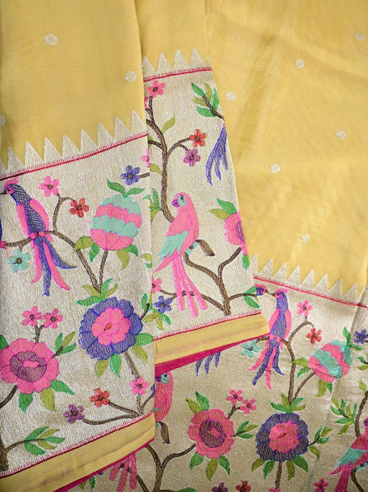 Dola tissue fancy saree golden yellow color allover zari motifs & paithani border with short pallu and plain self blouse