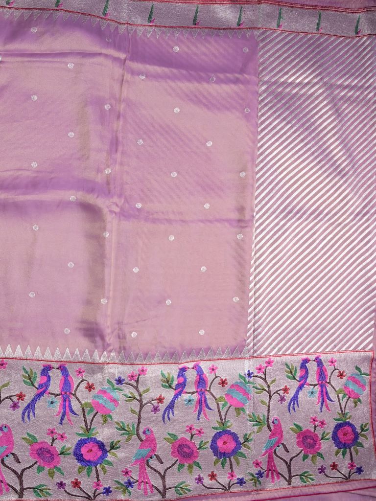 Dola tissue fancy saree light purple color allover zari motifs & paithani border with short pallu and plain self blouse