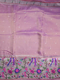 Dola tissue fancy saree light purple color allover zari motifs & paithani border with short pallu and plain self blouse