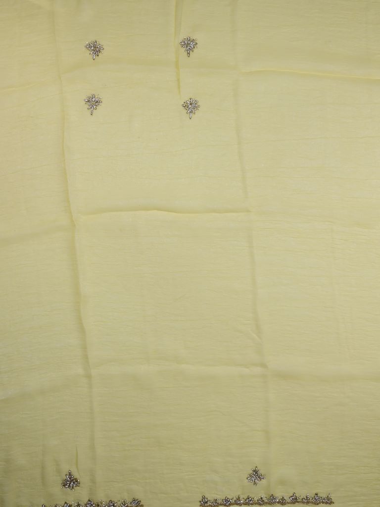 Organza shimmer light yellow color allover embroidery butis & embroidery border with running pallu and attached blouse