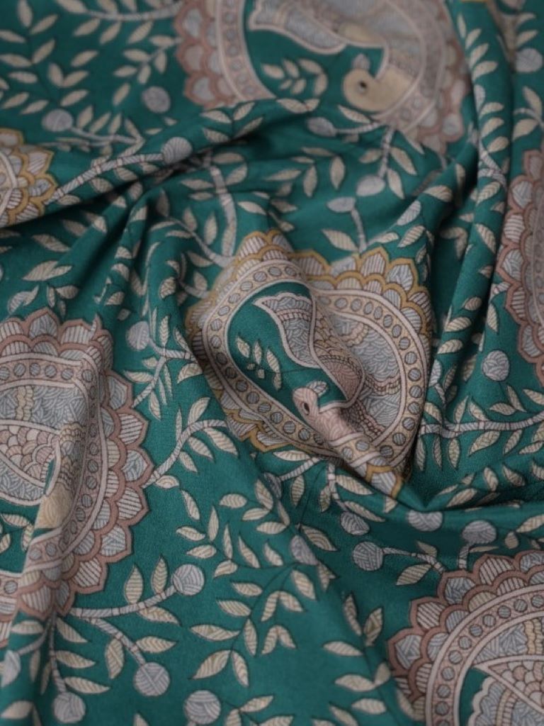 Crape fancy saree sea green color with allover digital prints & small border with printed pallu and attached blouse