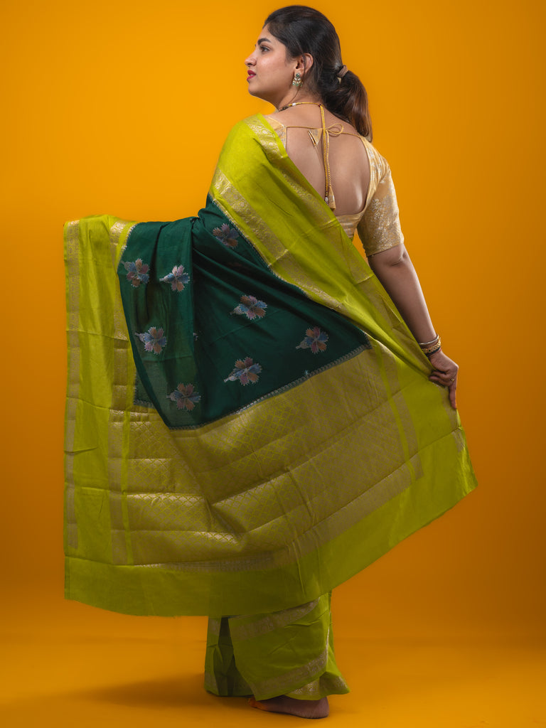 Banaras fancy saree bottle green color allover zari motifs & kaddi border with contrast brocade pallu and brocade blouse