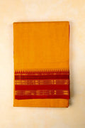 Narayanpet cotton saree yellow color with contrast zari border, short pallu and plain blouse.