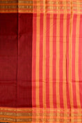 Narayanpet cotton saree maroon color with contrast zari border, short pallu and plain blouse.