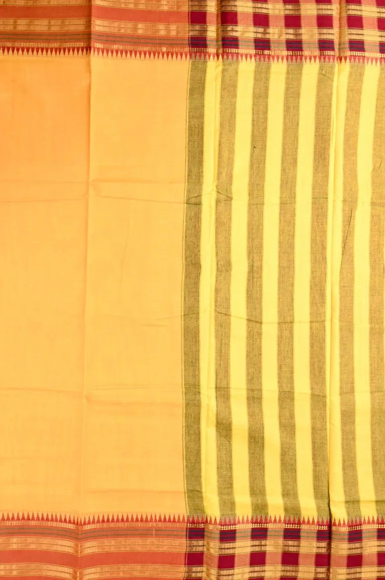 Narayanpet cotton saree yellow color with contrast zari border, short pallu and plain blouse.