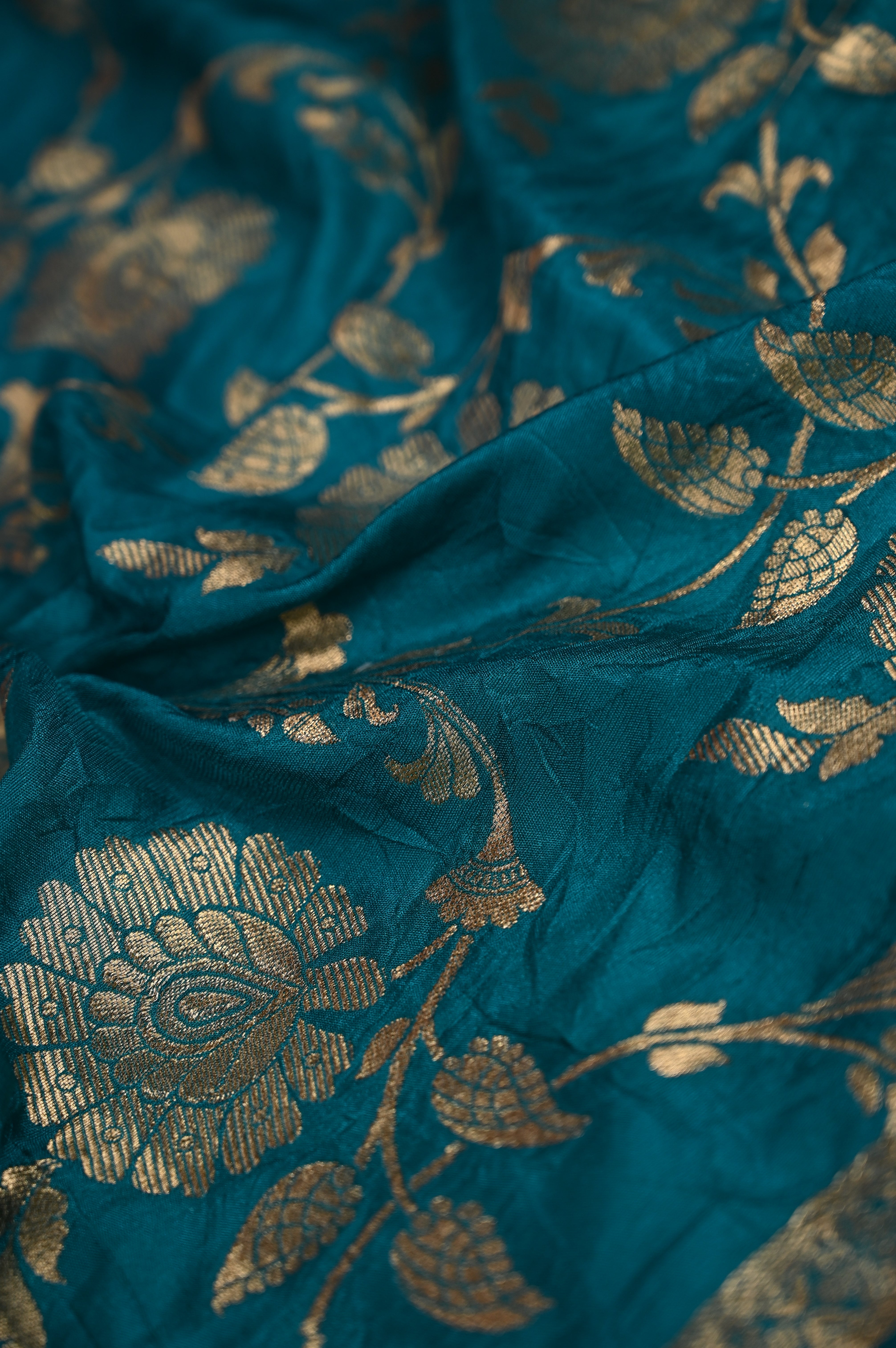 Banaras dupatta peacock blue color with allover gold zari weaves, small zari border.