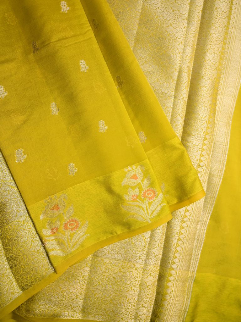 Chiniya fancy silk fancy saree mustard yellow color allover zari motifs & zari border with short pallu and attached brocade blouse