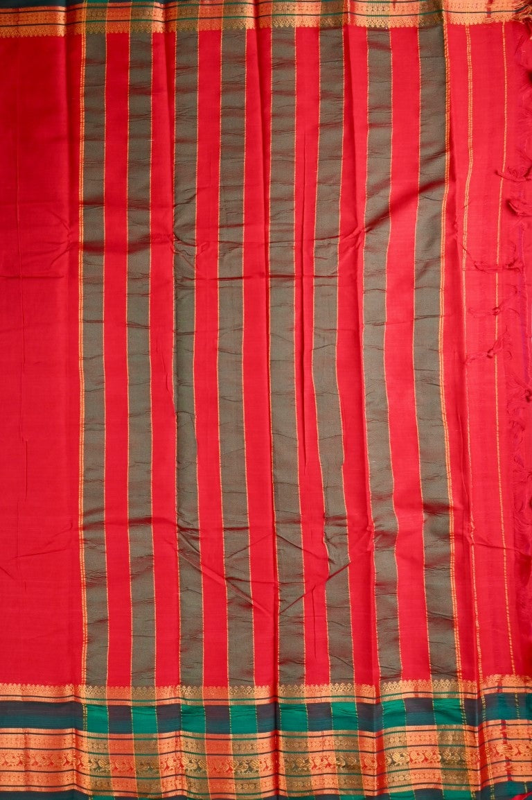 Narayanpet cotton saree red color with contrast big zari border, short pallu and plain blouse.