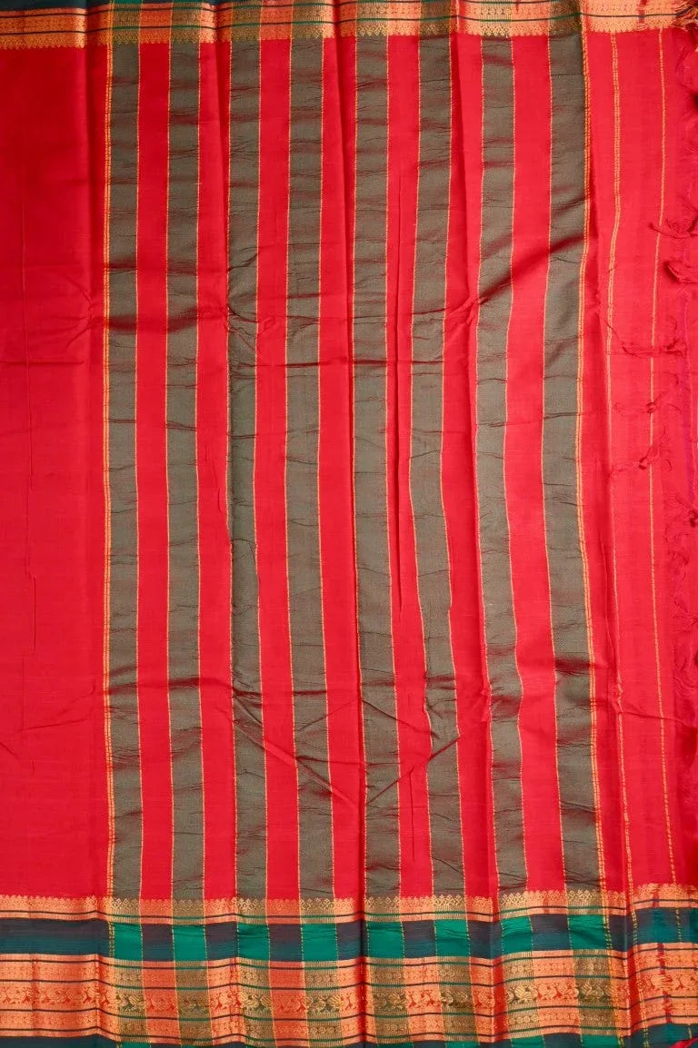 Narayanpet cotton saree red color with contrast big zari border, short pallu and plain blouse.