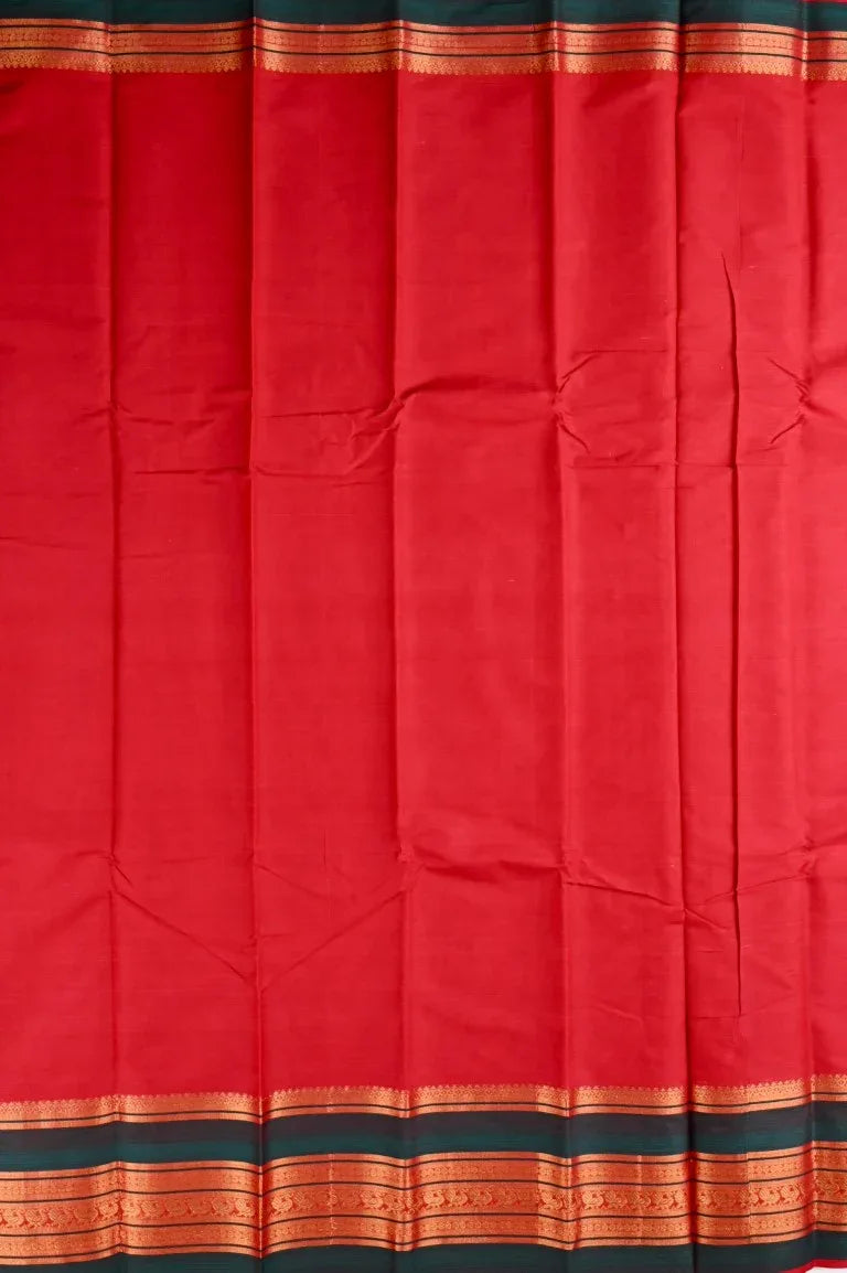 Narayanpet cotton saree red color with contrast big zari border, short pallu and plain blouse.
