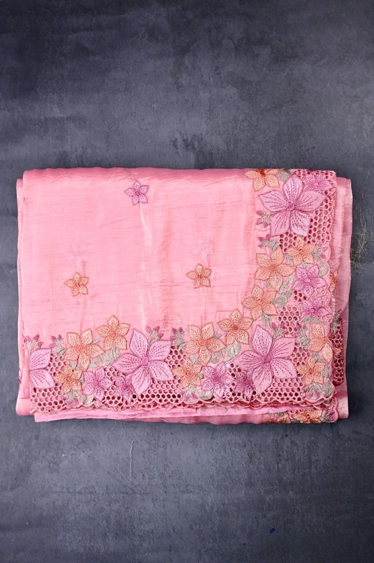 Fancy soft organza saree peach color with floral cutwork border, thread motive with running pallu and brocade blouse.