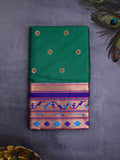 Banaras fancy saree bottle green color allover zari motifs & zari border with paithani pallu and attached contrast blouse