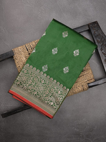 Banaras fancy saree bottle green color allover zari motifs & zari border with rich pallu and contrast plain blouse