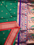 Banaras fancy saree bottle green color allover zari motifs & zari border with paithani pallu and attached contrast blouse