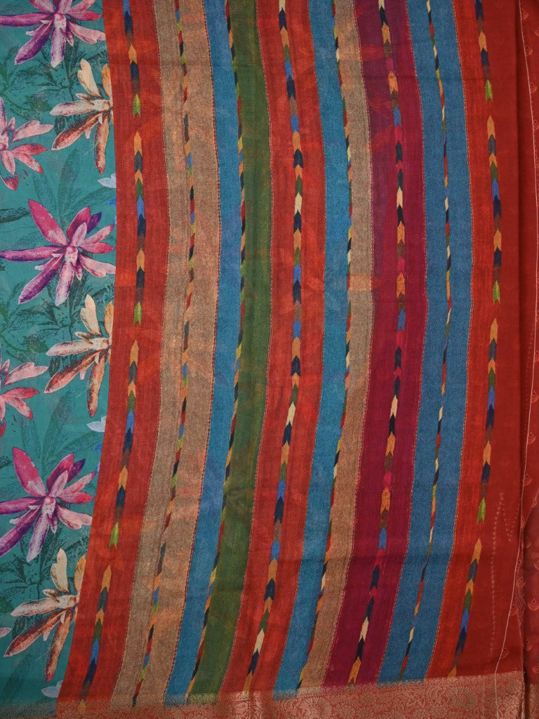Organza saree sea green and orange color with allover prints, small zari border, short pallu and printed blouse