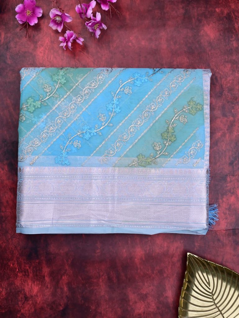 Organza fancy saree sky blue color allover embroidery & zari border with short zari pallu and attached plain blouse