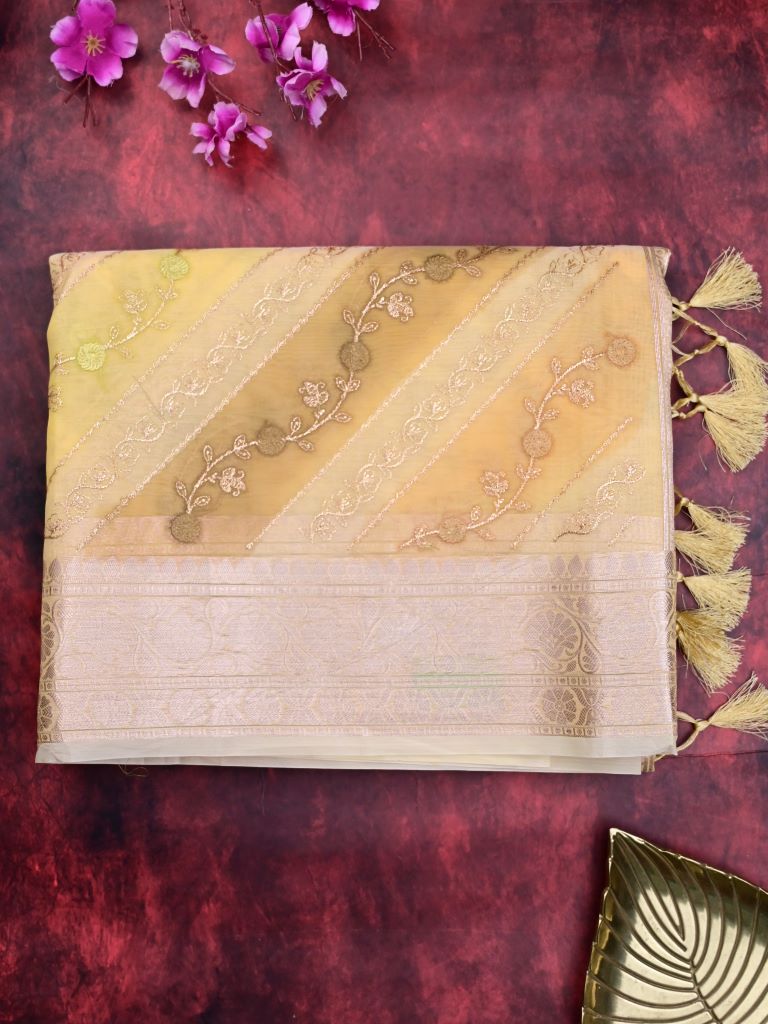 Organza fancy saree light yellow color allover embroidery & zari border with short zari pallu and attached plain blouse